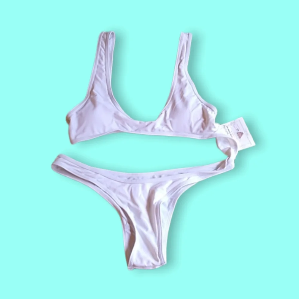NWT Callie Lives White Cut Out Monokini Xena tiny top